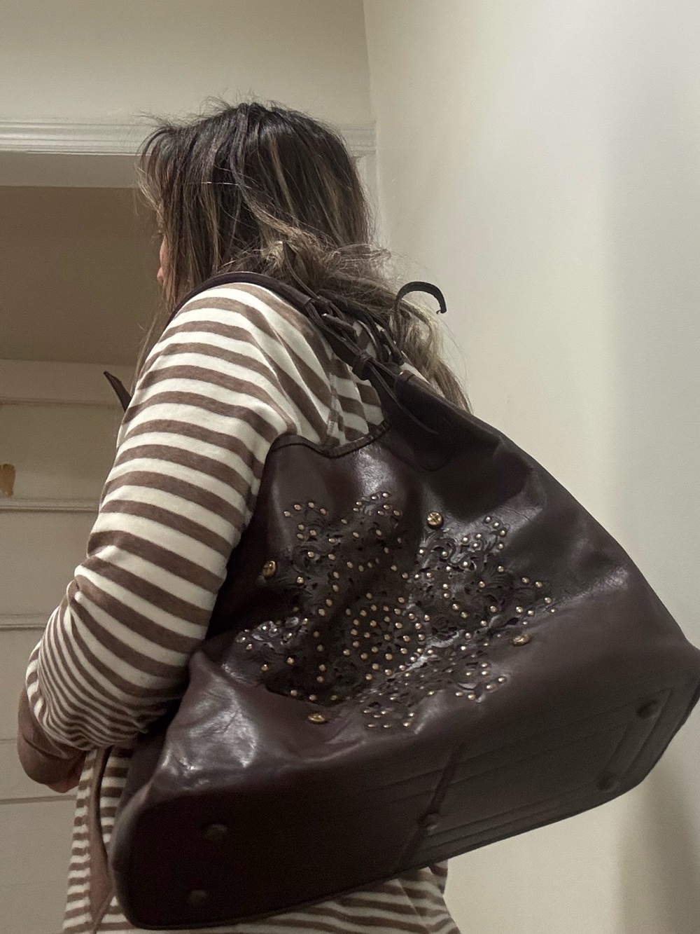 Platania Italian leather bag studded details and a laser cut-out floral design - Picture 10 of 11